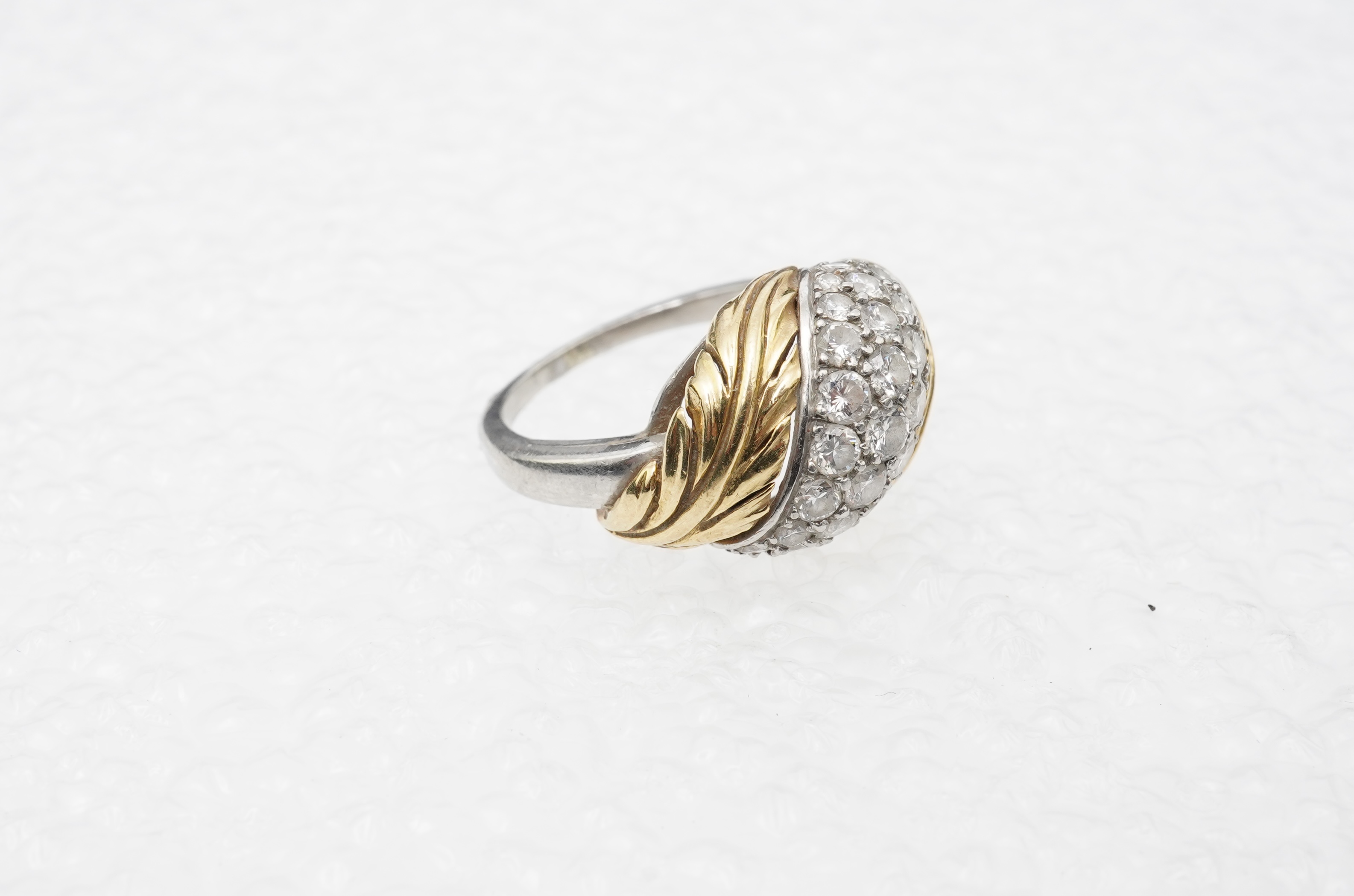 A gold and diamond dress ring, 1960s